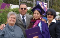 A photo of a student with her family