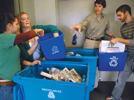 A photo of students sorting recycling.
