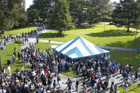 Photo of a crowd of students on the quad at an open house event for prospective students