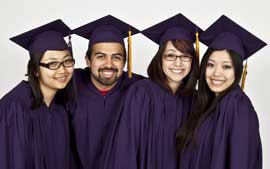 Photo of Graduates in cap and gown