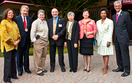 Photo of 2011 Alumni Hall of Fame inductees with President and Mrs. Corrigan
