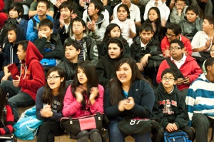 Martin Luther King Middle School students listen as Wells Fargo presents a $50,000 check to SF Promise on Tuesday.