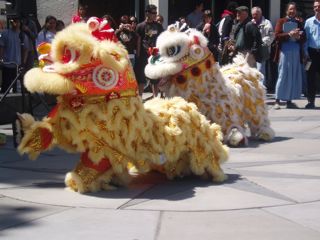 Two lion dancers