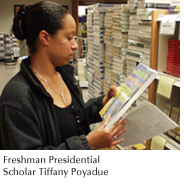 Photo of Presidential Scholar Tiffany Poyadue perusing a text in the SFSU Bookstore