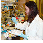 Photo of Erin Rohde working in a research lab