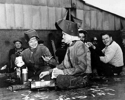 Photo of World War II-era women welders eating lunch 