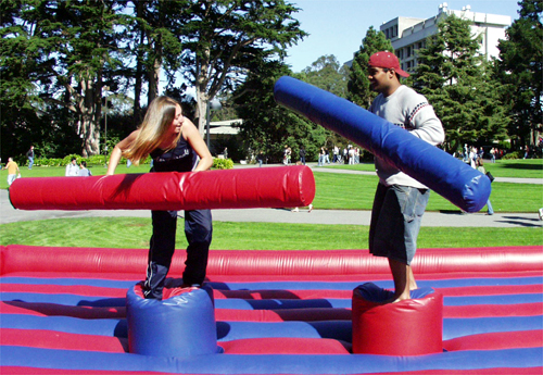 Photo of two students playing "gladiator jousting"