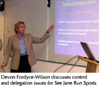 Photo of student giving a presentation on See Jane Run Sports