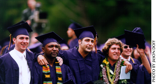 photo of four graduates