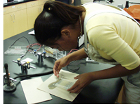 Photo of HealthPath student working in a science lab