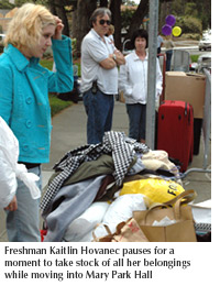 Freshman Kaitlin Hovanec surveys her belongings that still need to be moved into her room at Mary Park Hall