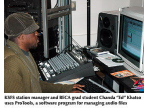 Photo of KSFS station manager Chanda "Ed" Khatso working 