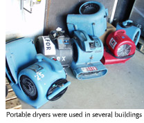 Photo of several portable dryers used in several of the buildings affected by the rainstorm