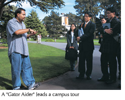 Photo of an SFSU "Gator Aider" leading a campus tour