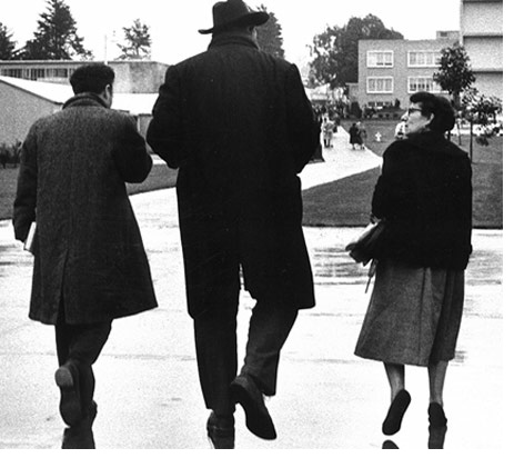 Photo of Robert Duncan, Charles Olson and Professor Ruth Witt-Diamant walking across the SF State campus in 1957