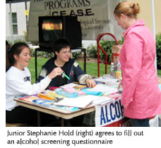 Photo of junior Stephanie Hold agreeing to fill out the alcohol screening questionnaire