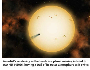 An artist's rendering of the hard core planet moving in front of star HD 149026, leaving a trail of its outer atmosphere as it orbits