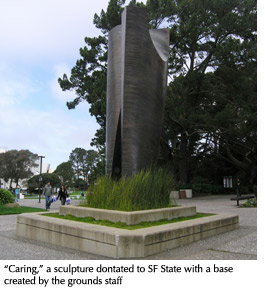 Photo of "Caring," an outdoor sculpture donated to SF State with a base created by the grounds staff