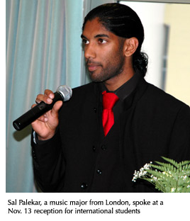 Photo of Sal Palekar, a music major from London, speaking at a Nov. 13 reception for international students