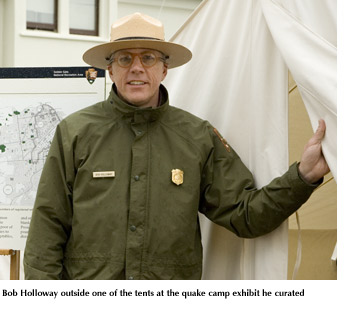 Photo of Bob Holloway inside onf the tents at the quake camp exhibit