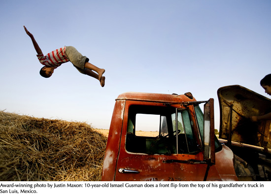 Award-winning photo by Justin Maxon: 10-year-old Ismael Gusman does a front flip from the top of his grandfather's truck in San Luis, Mexico.