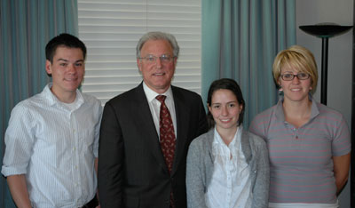 A photo of Provost Scholars Ryan Yao, Laura Escobar and Gwendolyn Tatro with Provost John Gemello.