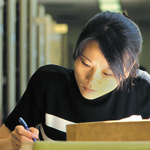 Photograph of a student studying at San Francisco State.