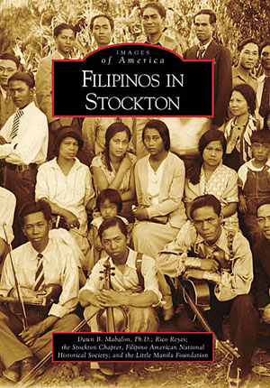 A photo of the jacket cover of "Filipinos in Stockton." Cover image shows Filipinos gathering for an afternoon of music and dancing in the 1930s.
