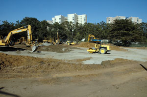 Heavy equipment clears and levels land at the site of the former Lakeview Center
