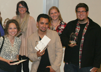 A photo of student James Martinez with other winners, "
