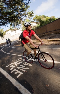 A photo of students using the bike path on campus.