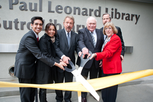 A photo of SF State Associated Students President Andrew Gutierrez; alumna Neda Nobari; President Robert A. Corrigan; David Leonard, son of former SF State President J. Paul Leonard; Brian Cahill, executive vice president of operations for Balfour Beatty Construction; and SF State Librarian Debbie Masters cutting the ribbon at the new J. Paul Leonard Library on April 10, 2012.