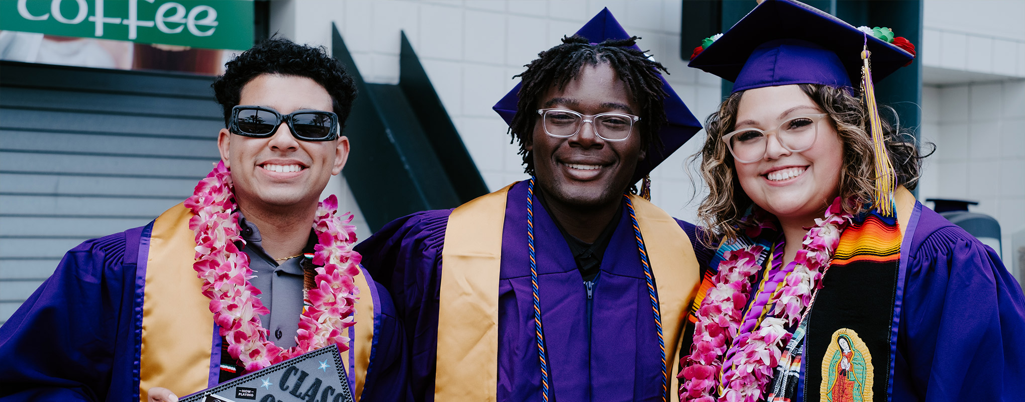 SF State graduates smile in their regalia