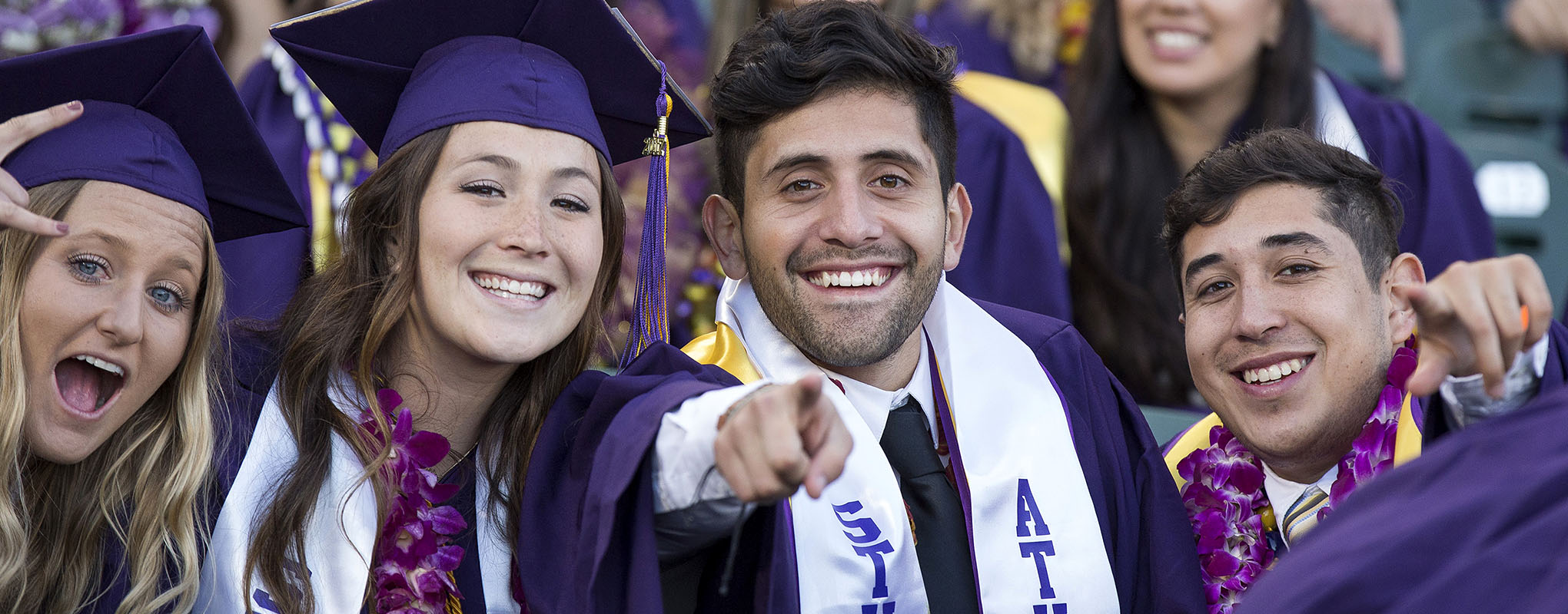 smilling SF State grads
