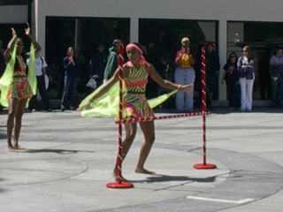 One African dancer approaches the limbo pole