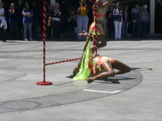 One dancer doing a low limbo