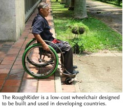 A man uses a Whirlwind wheelchair designed for rough terrain