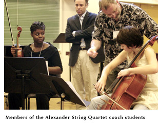 Members of the Alexander String Quartet coach students in a 2006 master class