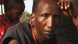 A still from Peter Biella's film 'Maasai Migrants' shows a Maasai elder, displaced in the city of Dar es Salaam.