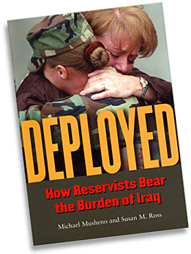 A photo of the jacket cover of "Deployed." The image shows a female soldier hugging a relative or friend. 