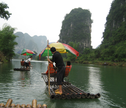 A photograph of San Francisco State students rafting on the Li River in Guilin, China.