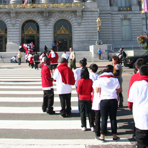 Photo of sixth graders lined up to enter San Francisco City Hall for SF Promise kick-off