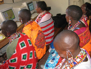 Photo of Kenyans learning to use the computers in a WiRED information hub.
