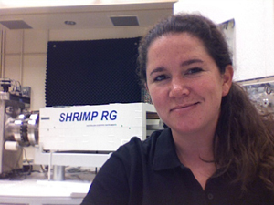 SF State Assistant Professor of Geosciences Mary Leech with the Sensitive High Resolution Ion Micrprobe (U-Pb SHRIMP) used in her research.