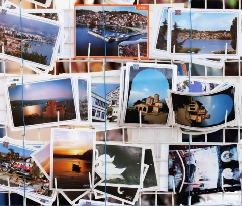 A photo of various postcards from around the world.