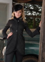 Photo of a woman modeling a black coat designed by alum Christopher Collins