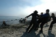 A photo of the class hauling in the net.