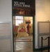 A photo of the entrance to the 'We are still here' exhibit on Alcatraz Island -- photograph by Philip M. Klasky includes original art by Apache artist Jose Garcia.