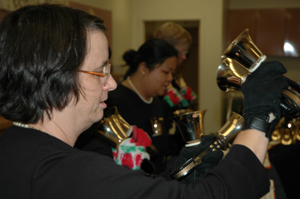 Photo of Caroline Harnly performing with handbells